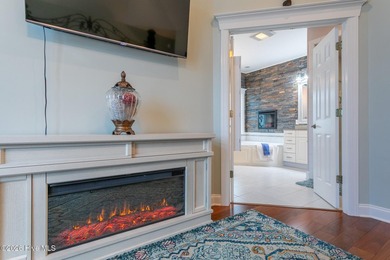 Located in the prestigious, gated waterfront community of - photo 14
