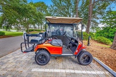 FURNISHED! GOLF CART INCLUDED! BAY, MARINA & GOLF COURSE VIEWS! - photo 17
