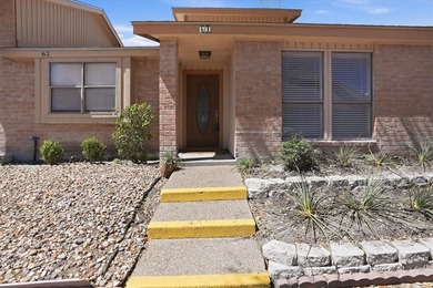 Welcome to this charming townhome located in the highly - photo 1
