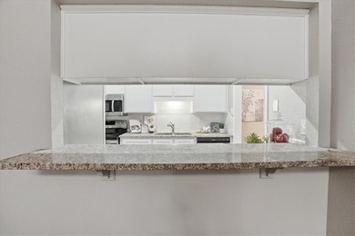 Welcome to this charming townhome located in the highly - photo 8