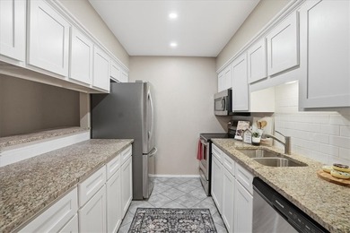 Welcome to this charming townhome located in the highly - photo 9