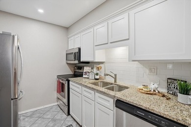 Welcome to this charming townhome located in the highly - photo 10