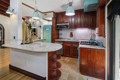 Nestled in the heart of Miami Springs, this beautifully updated - photo 5