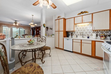 Step into this beautifully maintained, Tuscan-inspired residence