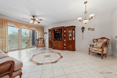 Step into this beautifully maintained, Tuscan-inspired residence