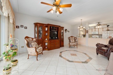 Step into this beautifully maintained, Tuscan-inspired residence