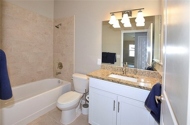 3/2 CBS End Unit across from the Pool. Easy access to three - photo 22