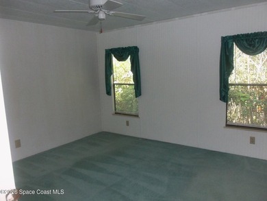 Here is a 24' x 38' Fleetwood home freshly painted light and - photo 8