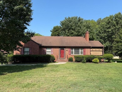 Opportunity awaits in the heart of Clarksville! This 4-bedroom - photo 1