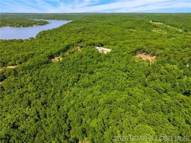 Perched above the Lake of the Ozarks with impressive views and a - photo 15