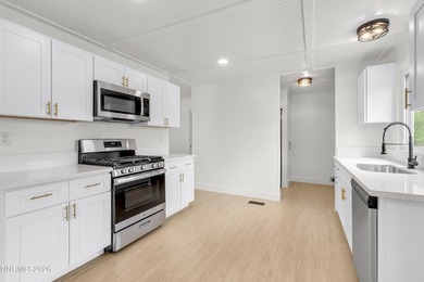Here is a wonderfully remodeled home at an affordable price. All - photo 15