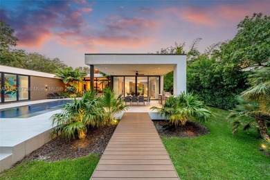 Set on a 39,639 sqft corner lot, this 2023 modern estate offers - photo 4