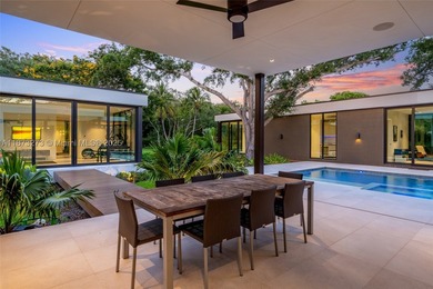 Set on a 39,639 sqft corner lot, this 2023 modern estate offers - photo 5