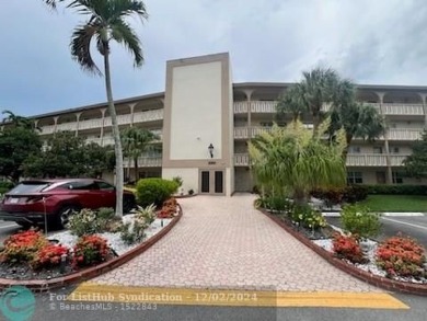 Lake Condo For Sale in Coconut Creek, Florida