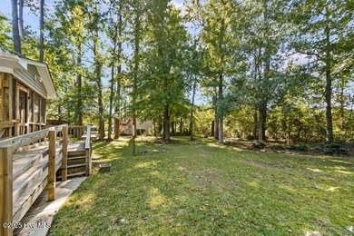 A splendid Stuart Hardy built house nestled in a gorgeous wooded