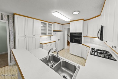 A splendid Stuart Hardy built house nestled in a gorgeous wooded