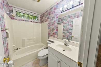 A splendid Stuart Hardy built house nestled in a gorgeous wooded