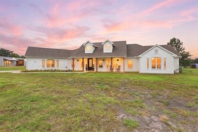 Luxury ranch living on 12.27 AG-EXEMPT acres just minutes from - photo 3