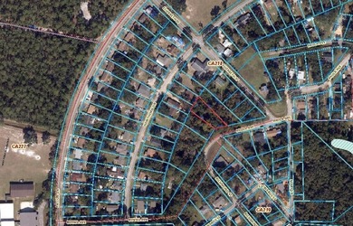 2721-acre wooded interior lot zoned MDR. Public water and - photo 2