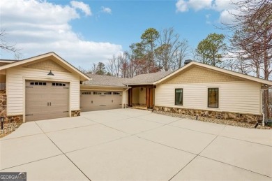 Lake Home For Sale in Flowery Branch, Georgia