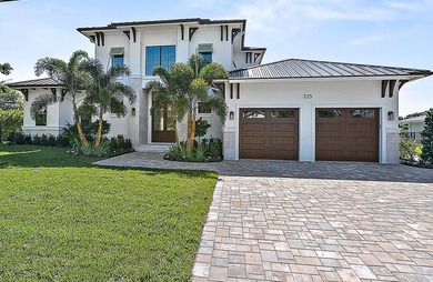 Welcome to your dream home in the heart of Tequesta! This brand - photo 2