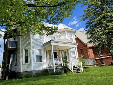 Two distinctive buildings, one downtown property, and nearly 5 - photo 3