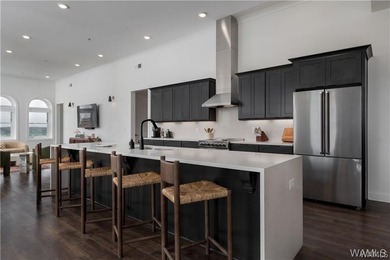 Perched above downtown, Unit 700 at The Alston is an impressive