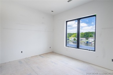 Experience elevated lake living at Harper's Cov! An exceptional - photo 11