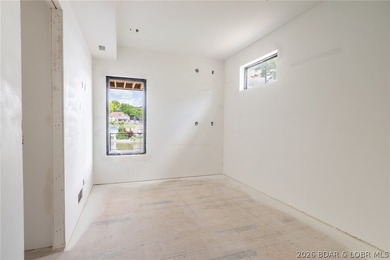 Experience elevated lake living at Harper's Cov! An exceptional - photo 12