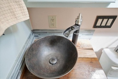 Welcome to this charming 3-bedroom, 2-bathroom land-owned home - photo 34