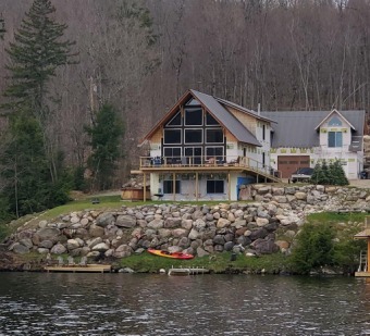 Lake Home Off Market in Malone, New York