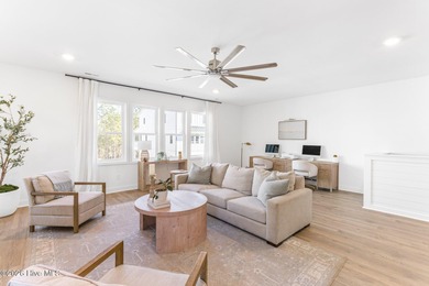 This beautifully appointed, premium end-unit townhome is like