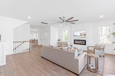 This beautifully appointed, premium end-unit townhome is like