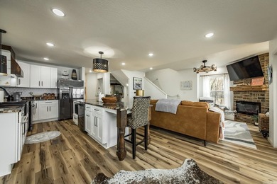This incredible LAKE HOME, just a little over a year old, offers - photo 16
