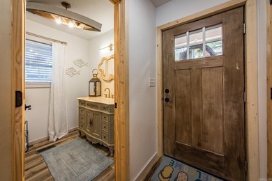 This incredible LAKE HOME, just a little over a year old, offers - photo 18