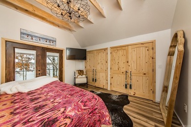 This incredible LAKE HOME, just a little over a year old, offers - photo 24