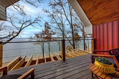 This incredible LAKE HOME, just a little over a year old, offers - photo 25