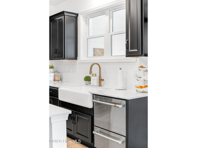 This beautifully appointed, premium end-unit townhome is like