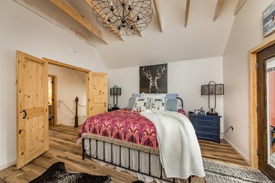 This incredible LAKE HOME, just a little over a year old, offers - photo 26