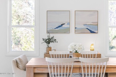 This beautifully appointed, premium end-unit townhome is like