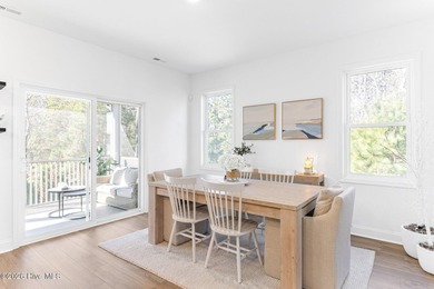 This beautifully appointed, premium end-unit townhome is like