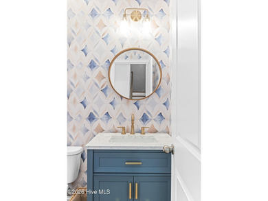 This beautifully appointed, premium end-unit townhome is like