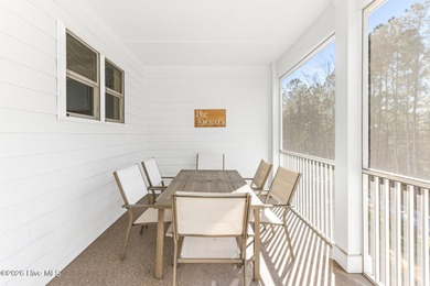 This beautifully appointed, premium end-unit townhome is like