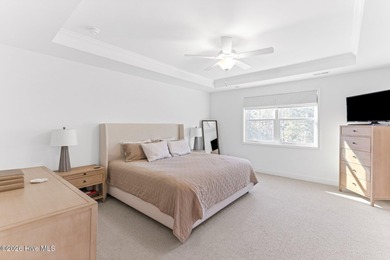 This beautifully appointed, premium end-unit townhome is like