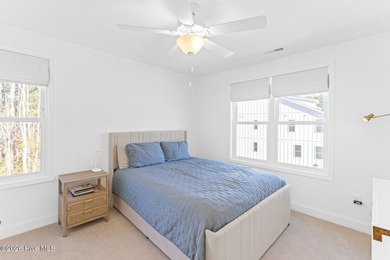 This beautifully appointed, premium end-unit townhome is like