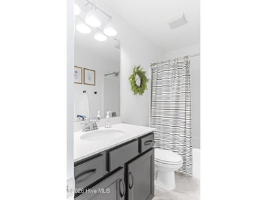 This beautifully appointed, premium end-unit townhome is like