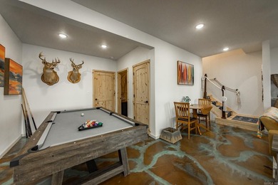 This incredible LAKE HOME, just a little over a year old, offers - photo 38
