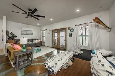 This incredible LAKE HOME, just a little over a year old, offers - photo 41