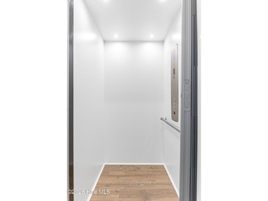 This beautifully appointed, premium end-unit townhome is like