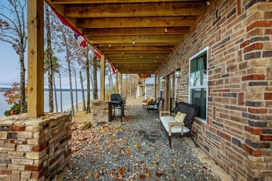 This incredible LAKE HOME, just a little over a year old, offers - photo 44